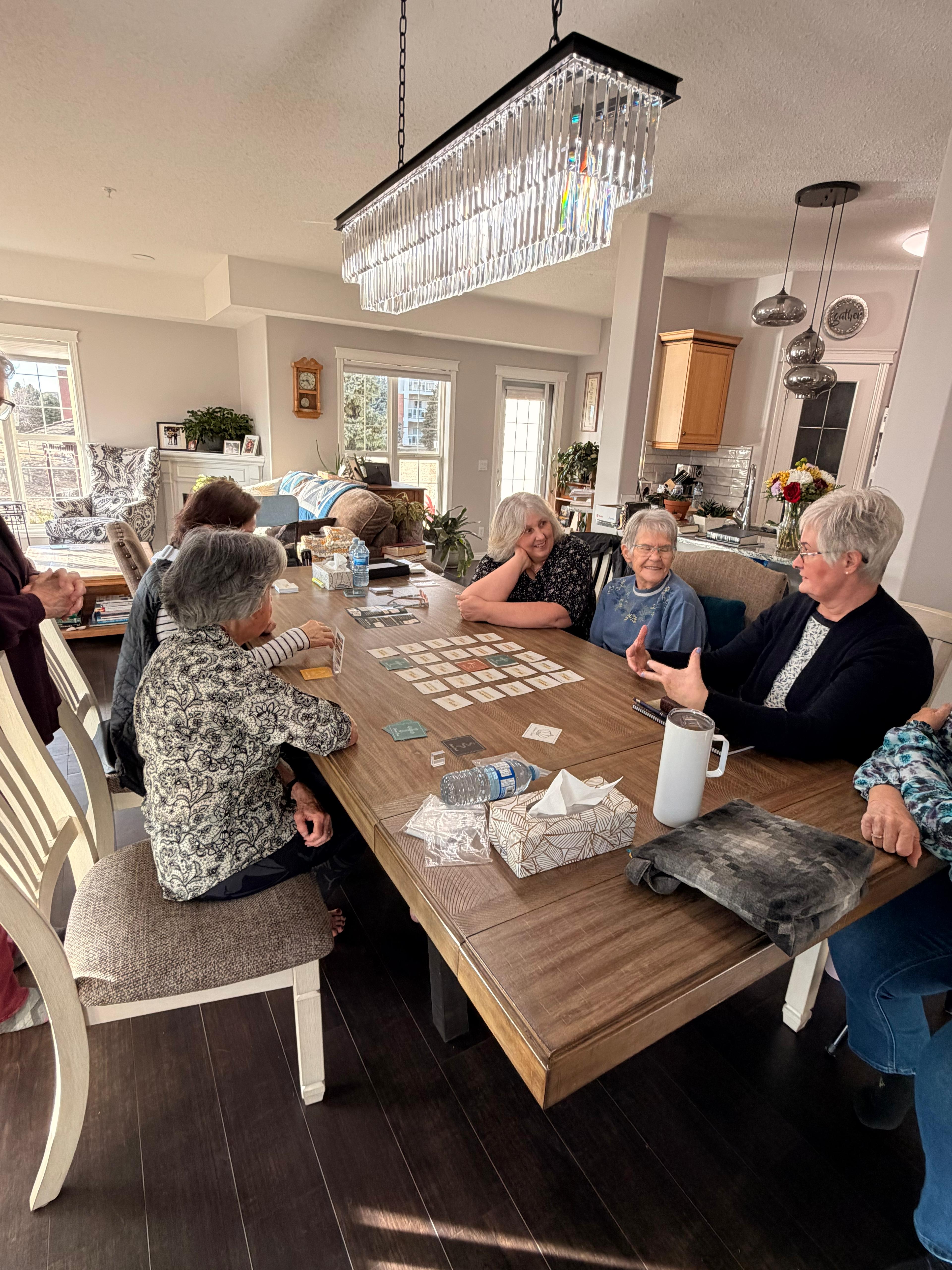 Ladies small group playing Revival at home